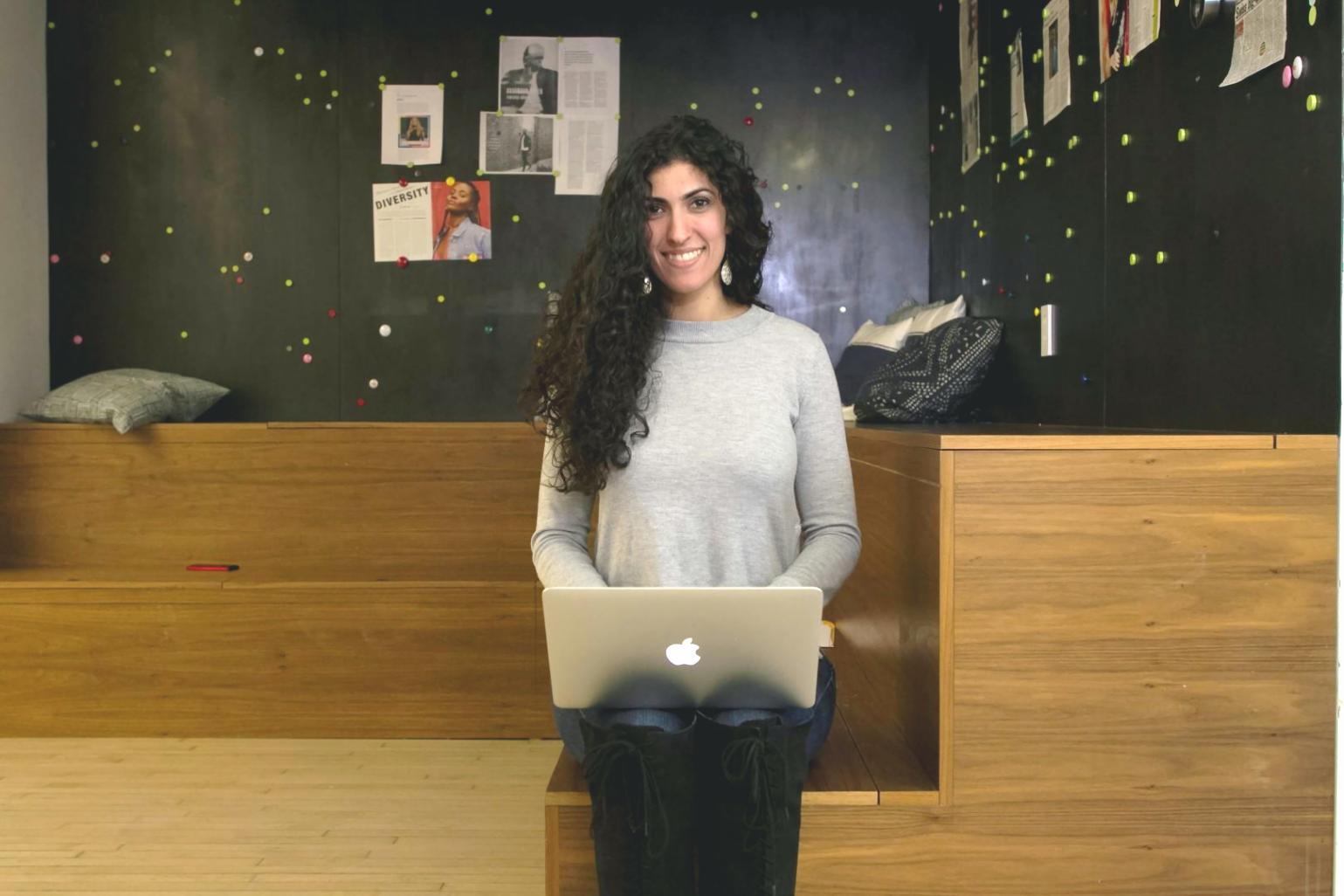 Business professional reviewing financial charts and budget planning materials